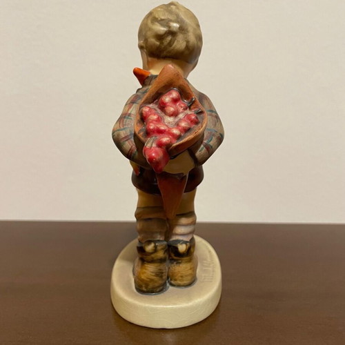 Hummel Goebel vintage porcelain figurine of child with dog and flowers