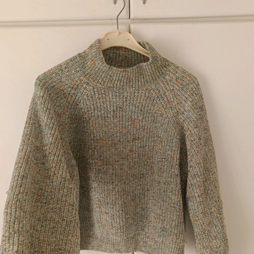 Knitted sweater new with high collar in beige multicolor shade