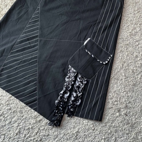 Midi asymmetrical black skirt used, with pocket, size 38