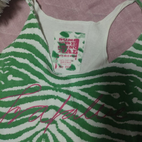 Women's green top used, sizes S and M