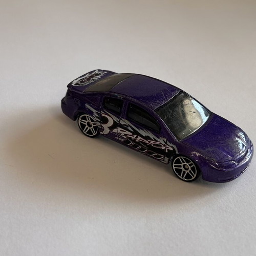 Hot Wheels 2002 Raptor Blast Series Saturn Ion Quad Coupe used