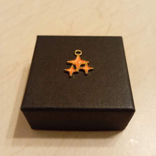 Pendant with star design, gold plated, new