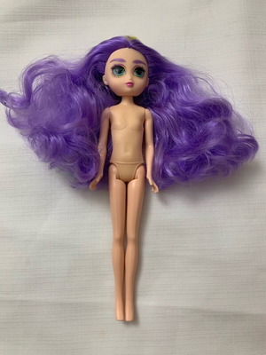 Doll like new with dense purple hair and turquoise highlights