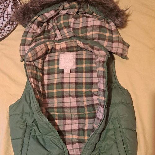 Green vest with hood and fur like new