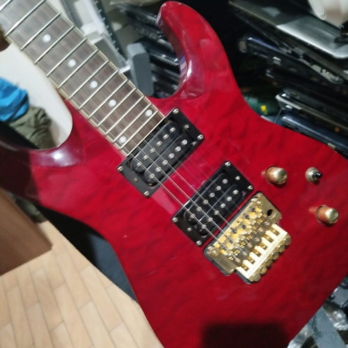 Electric guitar used for repair or decor