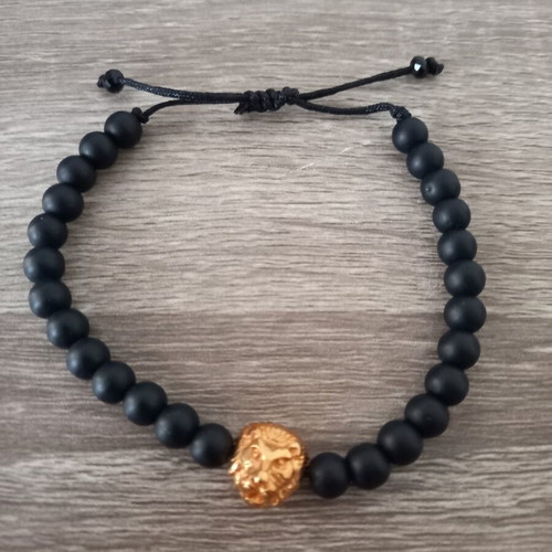 Unisex bracelet with black matte beads and lion head new