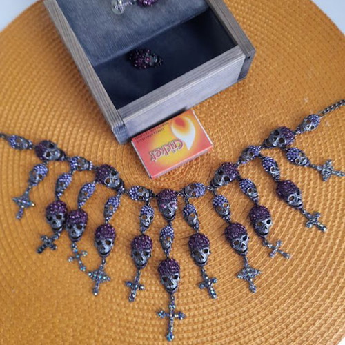 Earrings and necklace set with thousands of zircons like new