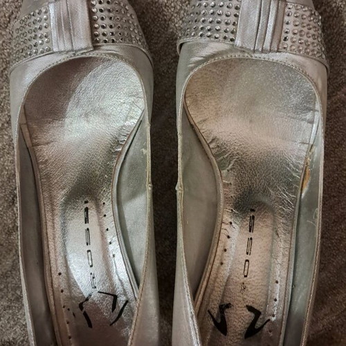 B. Rossi silver pumps size 38 used with low heel