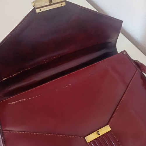 Vintage leather burgundy briefcase with dark green lining used