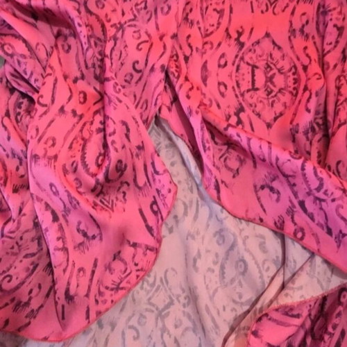 Wrap dress in bright fuchsia with ruffle sleeves