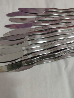 Stainless steel cutlery set like new, 52 pieces
