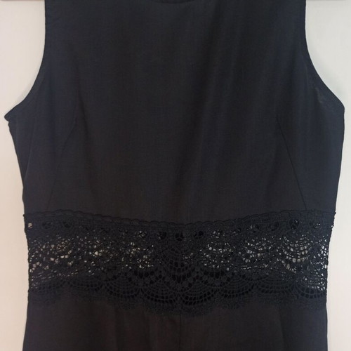 Regalinas black one-piece jumpsuit medium with perforated embroidery like new