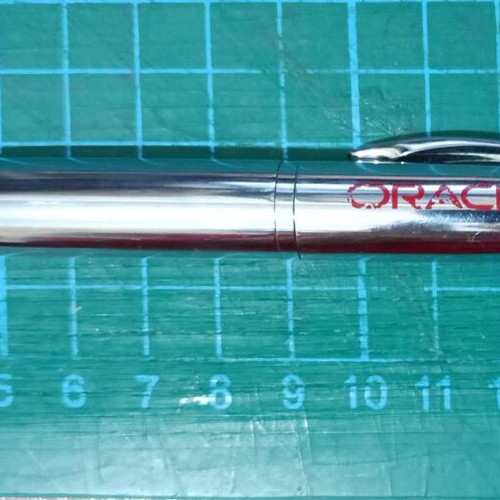 Vintage IBM pins, Oracle pen and Microsoft Office cap used