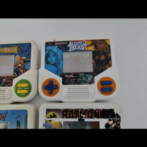 Tiger Electronics handheld games used, Karnov no sound, Batman worn, Simon's Quest excellent