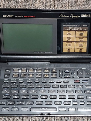 SHARP IQ-8300 MULTILINGUAL VINTAGE ELECTRONIC ORGANIZER 128KB MADE IN JAPAN