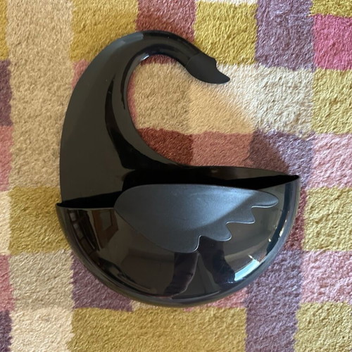 Bathroom accessory in black swan shape