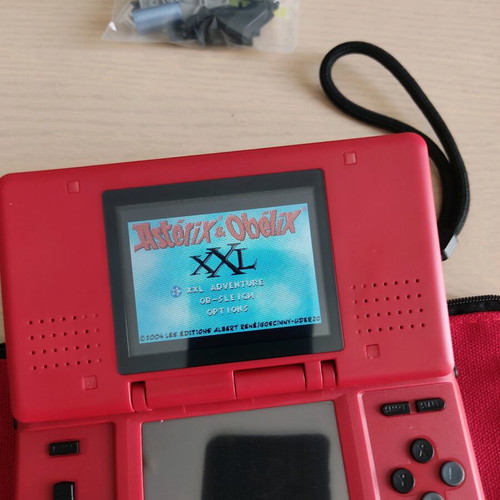 Nintendo DS (2004) console used with 2 games, charger, and accessories