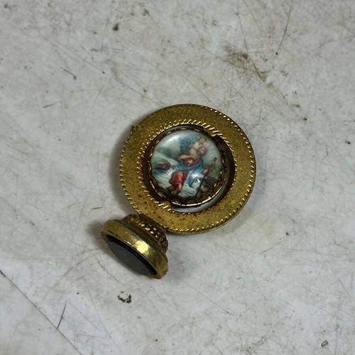 Vintage bronze magnet with double-sided Christian icon used