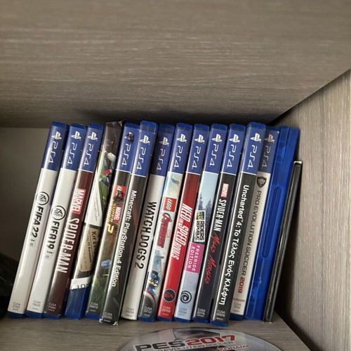 PS4 console with 1 controller and games bundle
