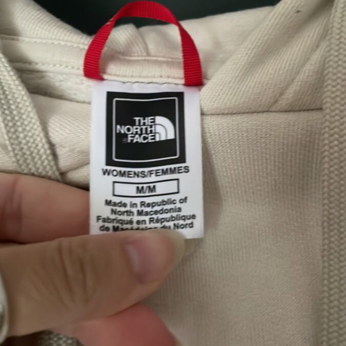 The North Face hoodie size M, like new with ink mark