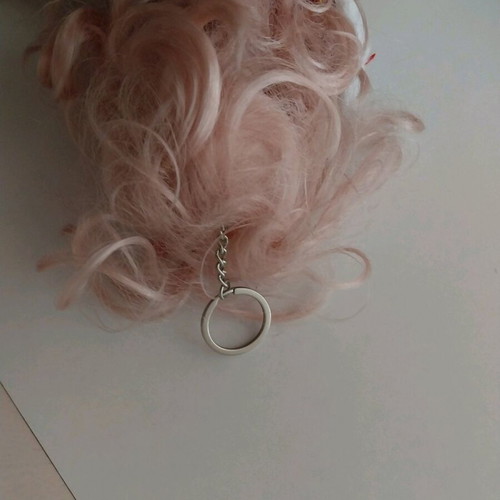 Music doll like new with Christmas outfit and keychain