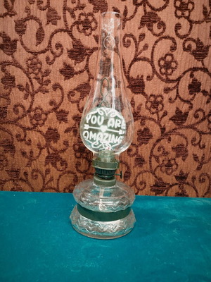Vintage oil lamp used with glass body and khaki details