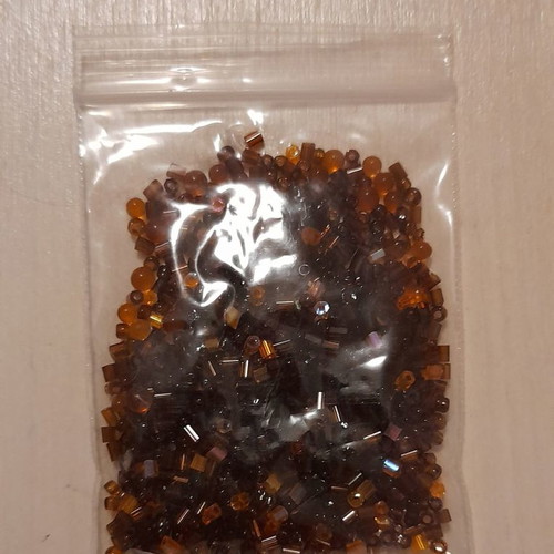 Glass seed beads brown translucent new