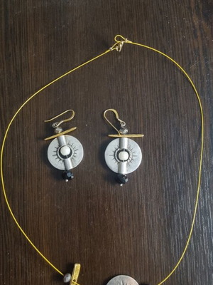 Boho style necklace and earrings set with sun pendant