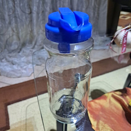Glass jug with plastic screw cap like new