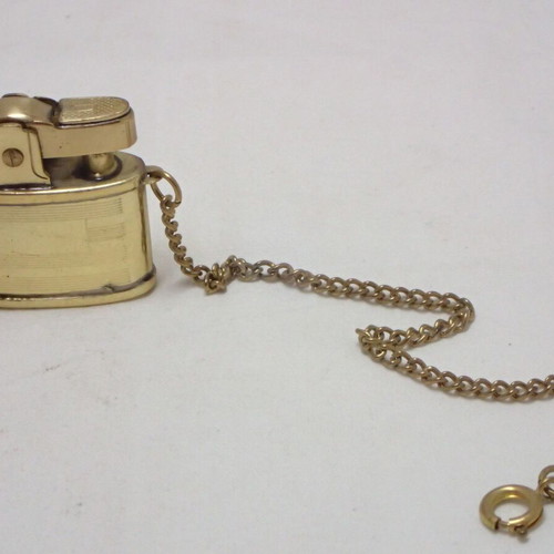 Vintage Penguin K Automatic Lighter made of brass, like new