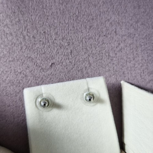 Swarovski star snowflake stud earrings like new, white