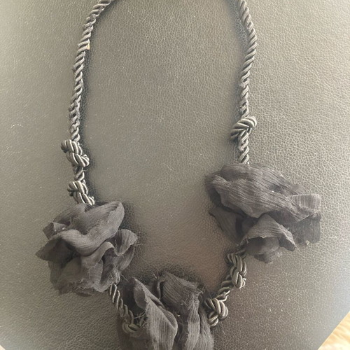 Pendant used with black fabric flowers