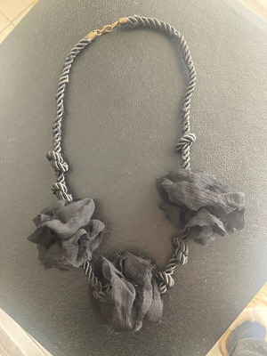 Pendant used with black fabric flowers