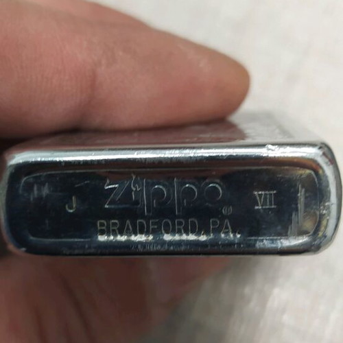 Zippo lighter used with small dent