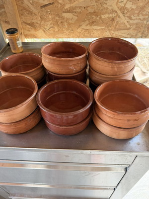 Clay plates pack of 14, like new, few used