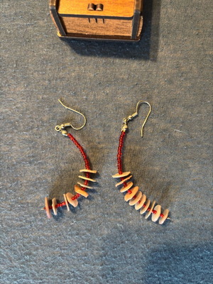 Special hanging earrings made of stainless steel, like new, red