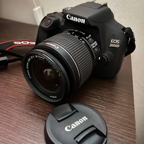 Canon Camera new with charger, carrying bag, and box