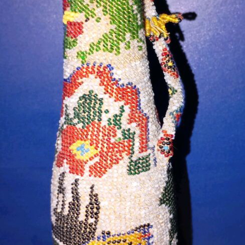 Bottle used with beads and 1924 decoration