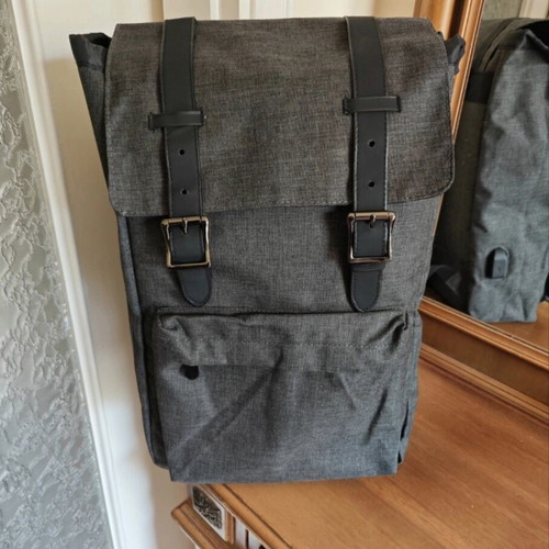 Backpack with laptop compartment and USB charging port