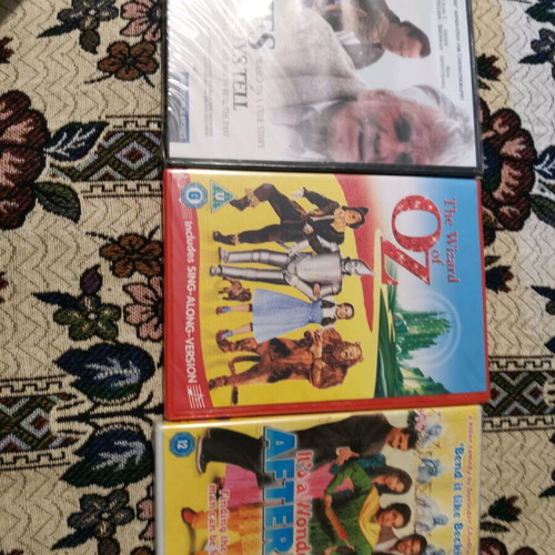 Collection of 10+ used movie DVDs with 3 sealed titles
