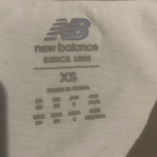 New Balance short sleeve shirt like new, white with print