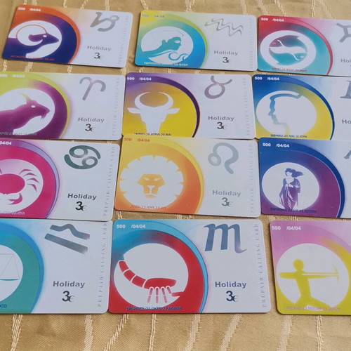 Holiday phone cards like new, pack of 12, zodiac theme