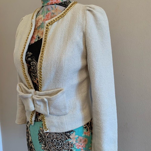 Unique handmade jacket like new, beige with gold chain and bow