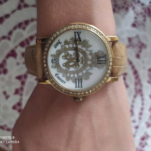 Juicy Couture watch like new with leather strap women's