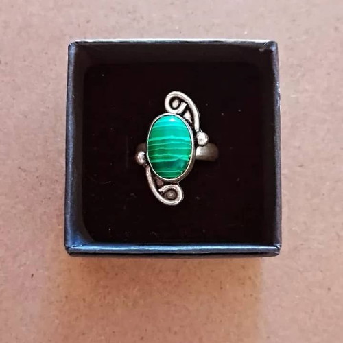 Handmade carved alpaca ring with green stone used