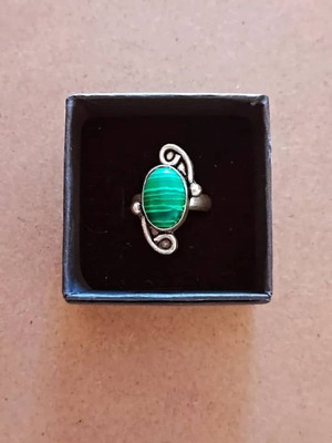 Handmade carved alpaca ring with green stone used