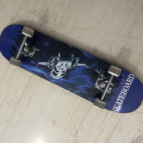 Skateboard used with satellite design on bottom