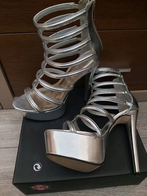 Silver sandals used, size 39