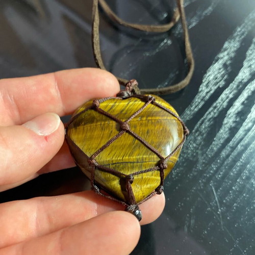 Tigers eye heart pendant made of semi-precious stone like new