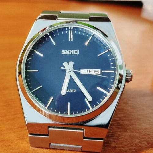 Skmei 70's Style Watch new, men's quartz with integrated bracelet